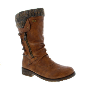 Keep your feet toasty this winter. Designed with soft lambswool lining and Remonte Tex water-resistant technology, your feet will stay comfortable and dry. Featuring attention to detail, these boots will easily become your favorite!