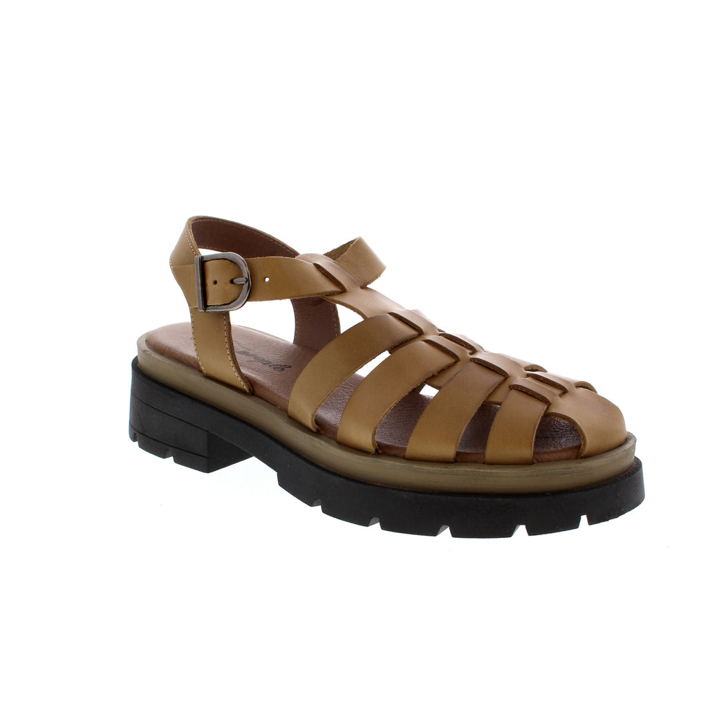 Free People Delaney Fisherman are retro-inspired sandals that feature a woven strap, cushioned footbed, adjustable ankle strap, covered toe and a chunky platform sole.