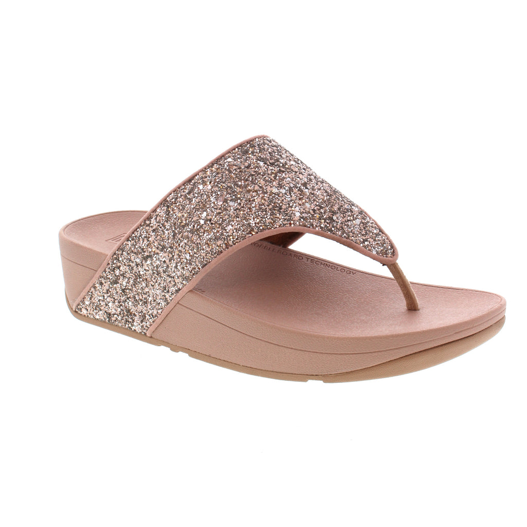 Glitter! Glitter! Glitter! These sparkly thongs are softly padded and feature FitFlop's legendary Microwobbleboard™ midsoles for the ultimate comfort and cushioning. Try these sandals on; your feet and wardrobe will thank you!