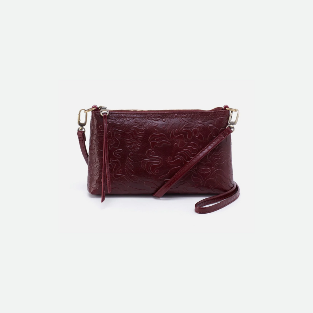 Darcy is an iconic and convertible crossbody, baguette bag and wristlet. Crafted in vintage hide leather and ample storage, this bag will quickly become a favorite. 