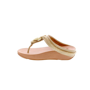 Experience superior comfort with FitFlop's Fino Crystal-Cord sandal. Crafted with premium leather for softness and breathability, these sandals feature a rocker-bottom sole for shock absorption, light arch support for superior comfort, and a 1-2