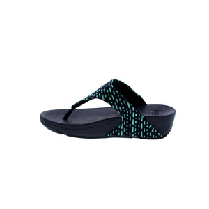 The FitFlop Lulu Geo-Webbing sandal is designed to deliver superior cushioning and shock absorption in a lightweight, comfortable package. Its microfiber upper, rocker bottom and 1-2