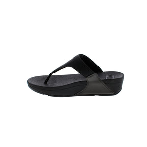 FitFlop's Lulu Shimmerlux sandals in silver feature light arch support and shock-absorbent technology for casual comfort. They are crafted with a leather upper, rubber outsole and microfiber lining for durability. The rocker bottom and flatform heel elevate the look of the 1-2