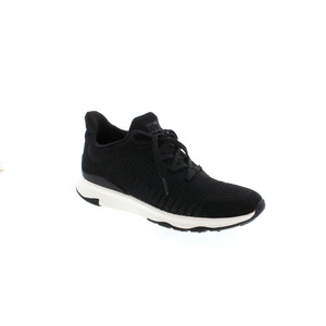 The FitFlop Vitamin FFX Knit Sneaker is engineered with a high-performance combination of polyester, nylon, and mesh upper, and a lightweight rubber sole for superior comfort, traction, and arch support. Perfect for casual or athletic wear, these stylish black lace-up sneakers will get you through the spring and summer in comfort and style.