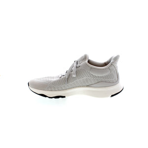 The FitFlop Vitamin FFX Knit Sneaker is designed with comfort in mind, featuring an upper construction of polyester, nylon, and mesh for breathability and support. With a closed toe, light arch support, and a rubber outsole, this versatile sneaker is perfect for a variety of occasions, from casual to athletic.