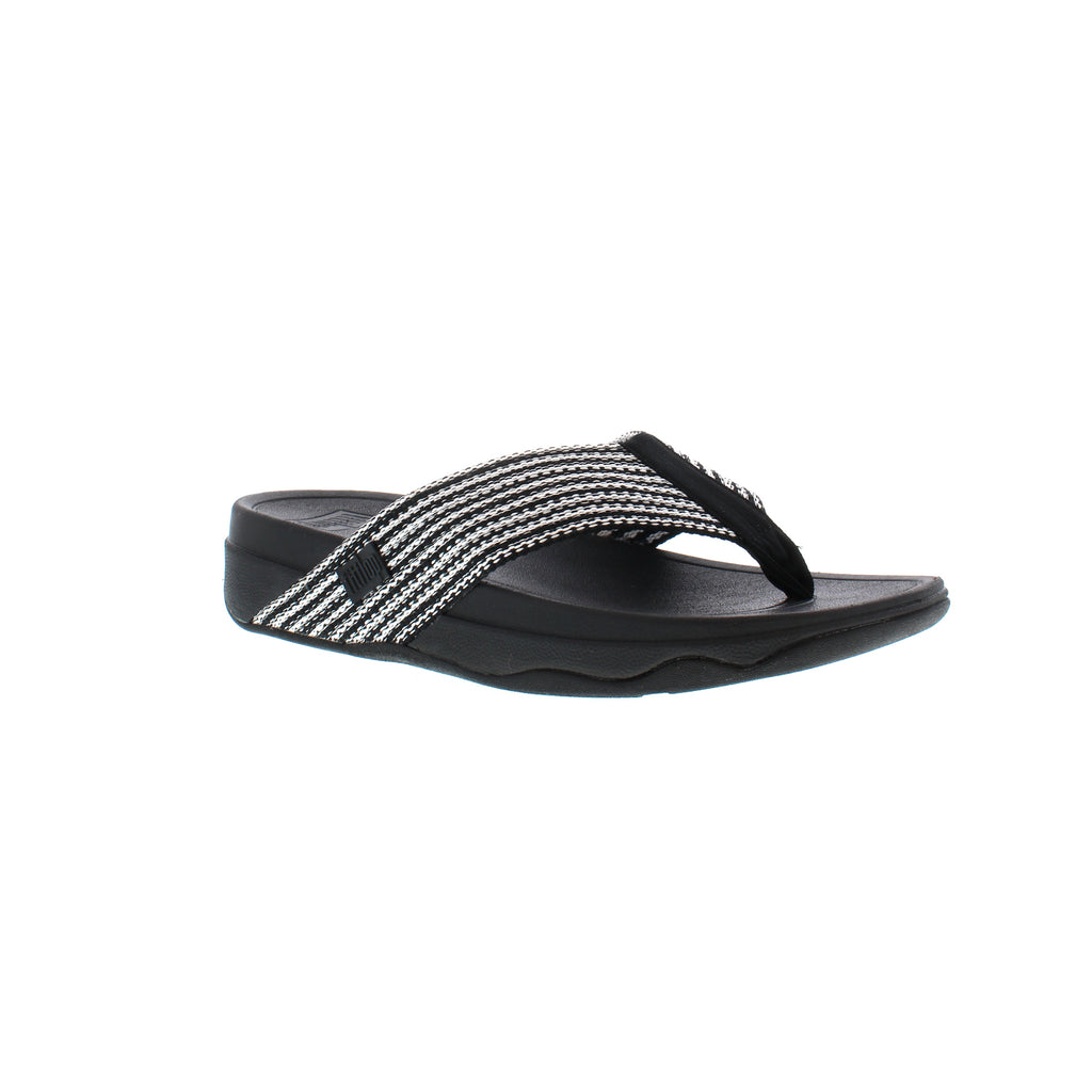 The Surfa FitFlop is an excellent choice for summer! These sandals feature wide, foot-hugging straps, a soft, fabric toe-post, and a Microwobbleboard™ midsole to keep your feet comfortable anywhere you adventure!
