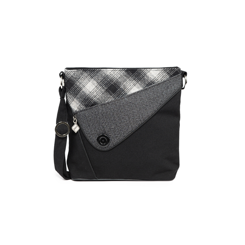 Jak's Henry keeps you looking classy while adding a fun "pop" of plaid. With a large interior pocket, you'll be able to carry all of the necessities no problem! 