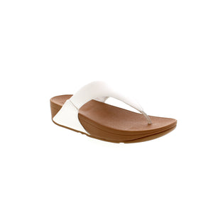 FitFlop Lulu Leather sandals are designed for style and comfort, featuring light arch support, a rocker-bottom outsole and shock-absorbent cushioning. Crafted in leather, with a round toe and thong style, these sandals add a contemporary look to any summer wardrobe.