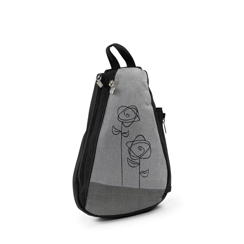 Jak's Classique Dublin is the perfect backpack for on the go! With zippers galore to keep your belongings secure, this backpack also features a flower design to make this backpack uniquely yours!