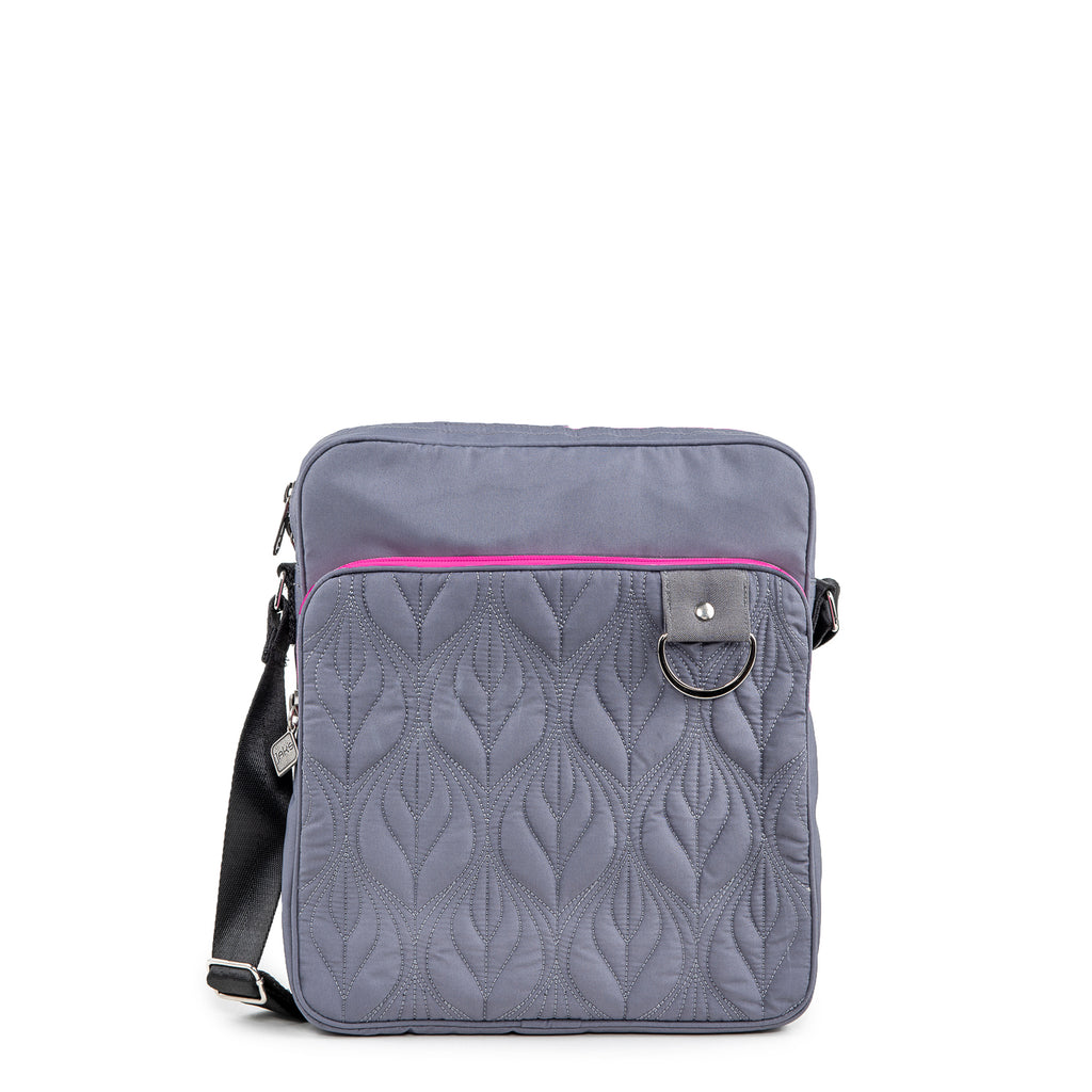 Jak's Actuelle Jeanne features a quilted leaf design to add that "little extra" to your day-to-day. With a zippered organizer pocket to keep your belongings secure, a metal ring for easy clip-on and an adjustable strap to fit your unique needs - this bag will carry just about anything you throw its way!