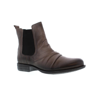 Miz Mooz puts a fresh twist on the classic Chelsea boot. Featuring soft, buttery leathers, distinctive ruching, elastic sides for easy entry and a cushioned footbed, your feet will be smiling all day.  