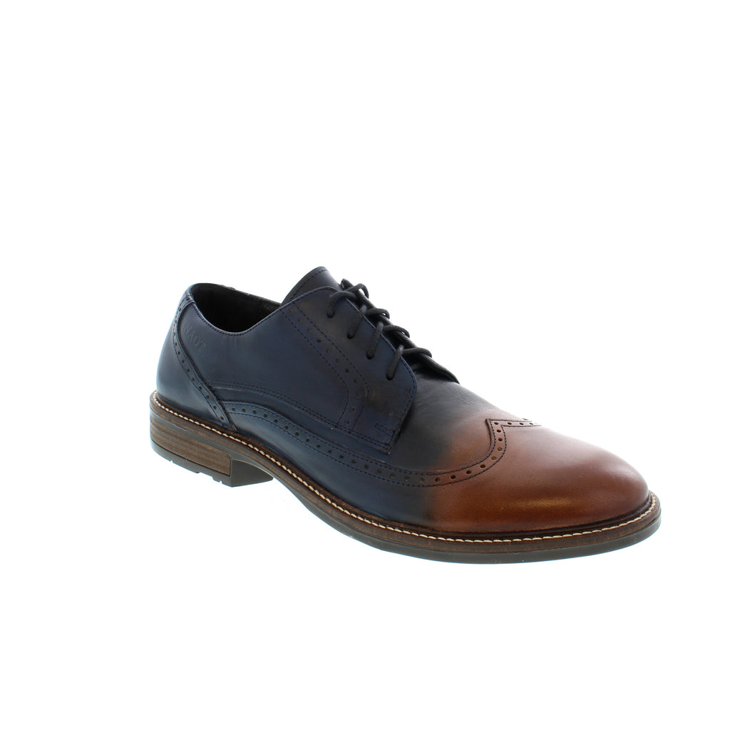 The Magnate lace-up wingtip shoe has a padded heel cup and tongue for ultimate comfort. Padded technical lining in the front for comfort and moisture absorption, this shoe is designed with Naot's removable, anatomic cork and latex footbed that molds to the shape of your foot with wear.