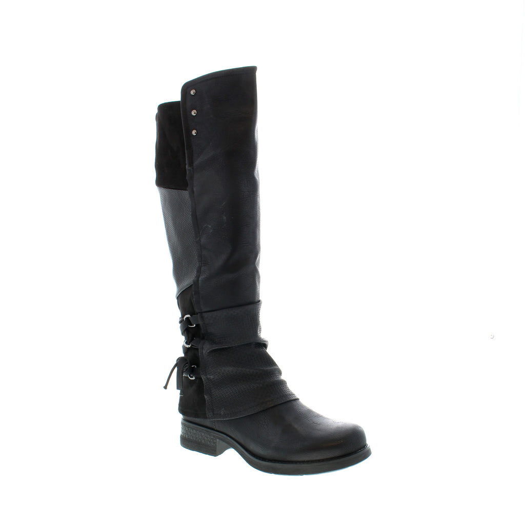 The Patrizia Maxie tall leather boot is sure to turn heads! Crafted from Vegan leather, this knee-high boot is designed with a side zipper for easy on/off, ruching, panelling, lace-up detailing and a gripped sole for traction to bring you the perfect combination of fashion-forward design without sacrificing comfort!