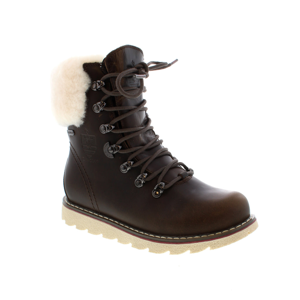 The Cambridge from Royal Canadian is a luxurious, sleek boot with a waterproof premium leather upper with a cozy warm wool lining. Crafted with memory foam insoles and a shearling fur collar, your feet will stay toasty warm while looking fashion-forward. 