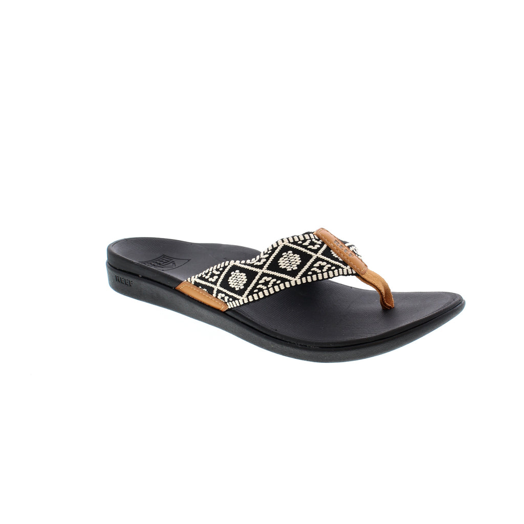 The Reef Ortho Woven sandal features enhanced arch support, and optimized heel cupping delivers anatomical contouring for all-day comfort. This shock-absorbent sandal reduces impact with an ECO-One Enhanced Biodegradability footbed. Designed with Vegan Leather detailed straps with padding for comfort and PVC-free materials, a molded rubber outsole gives you traction when you need it most. 