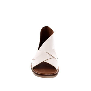 Free People Sun Valley is an open-toe style and soft leather fabrication with crisscross strap detailing side cutouts and a minimal stacked heel.
