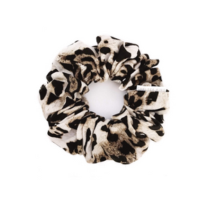 The Vangogh Leopard scrunchie should be in every woman's wardrobe! Styled as a basic neutral throughout the year - you'll fall in love with this design!