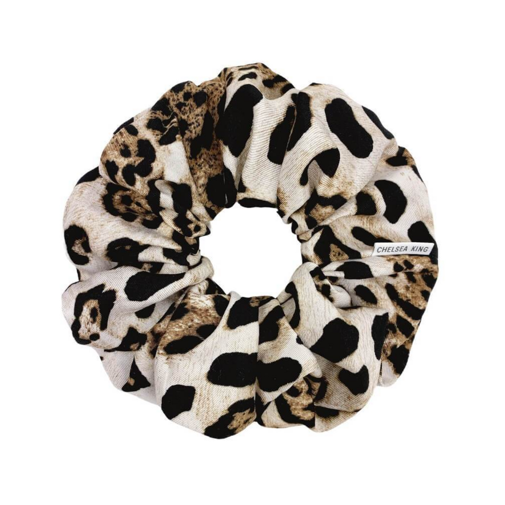 The Vangogh Leopard scrunchie should be in every woman's wardrobe! Styled as a basic neutral throughout the year - you'll fall in love with this design!