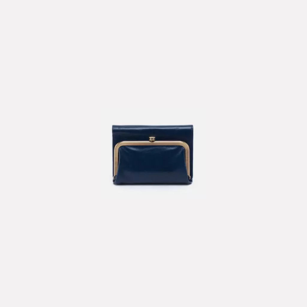 The Robin wallet features a vintage-inspired frame, hidden magnetic closure, bill slot, slip pocket, zip pocket, ID holder & 4 credit card slots to keep you organized and fashionable!