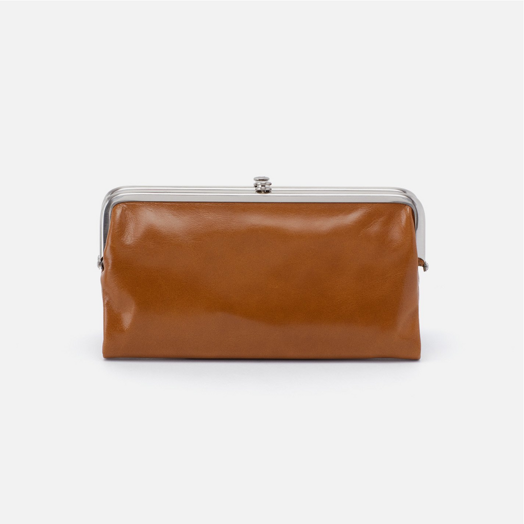 The Lauren clutch wallet is timeless and practical. Crafted in a vintage hide and designed with organizational pockets to keep your valuables secure. 