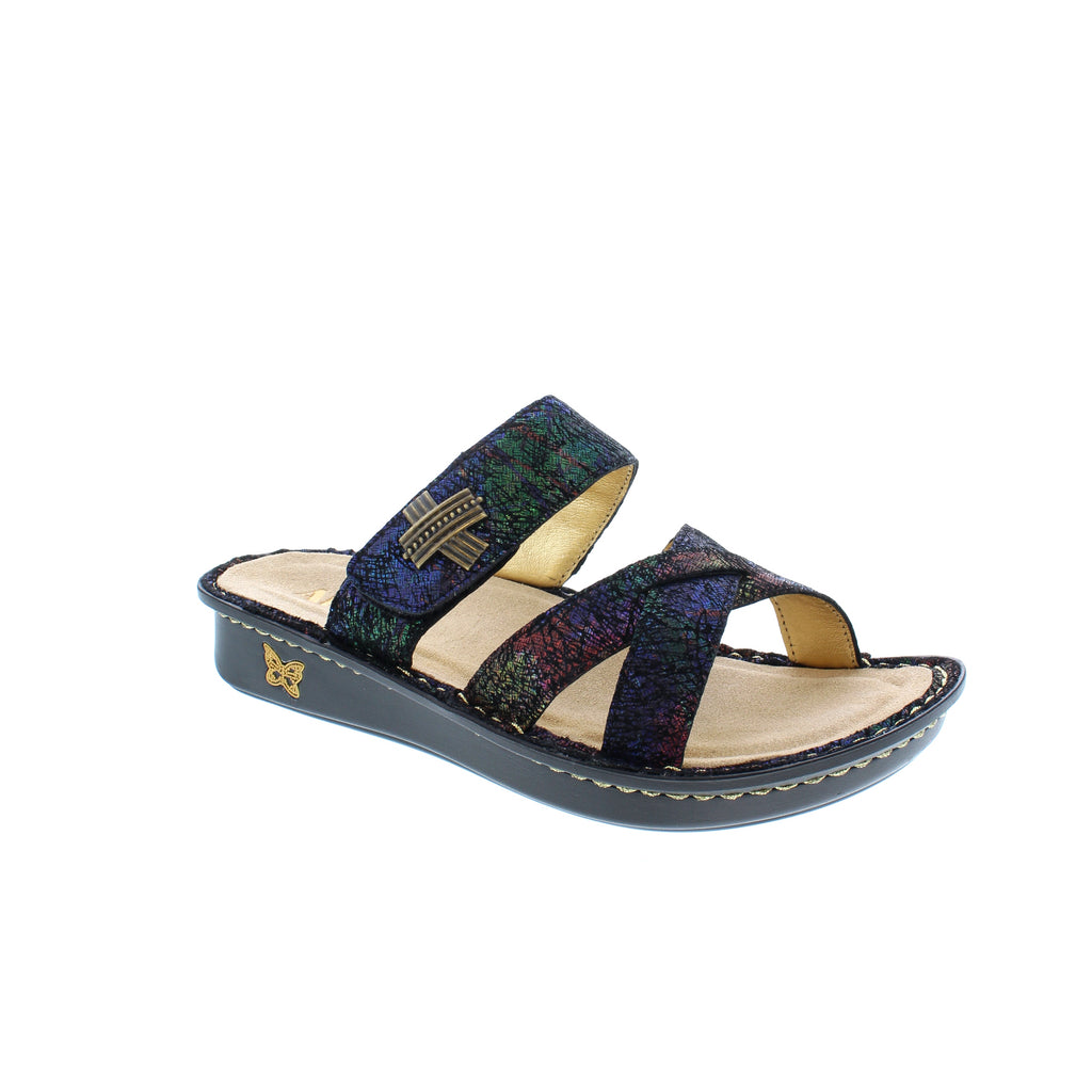 The Victoriah sandal features criss-cross straps and adjustable velcro closure for the perfect fit. A mini rocker outsole supports with superior arch support, a leather lining and insole, removable and replaceable footbed keep your feet feeling great with every step!