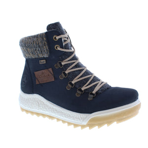 This lace-up boot is designed with soft imitation leather and enhanced with a padded felt collar. The fluffy warm lining made of textile fleece, RiekerTex membrane water-repellent technology and rubberized outsole ensure your feet stay dry for all of your Winter walks. 